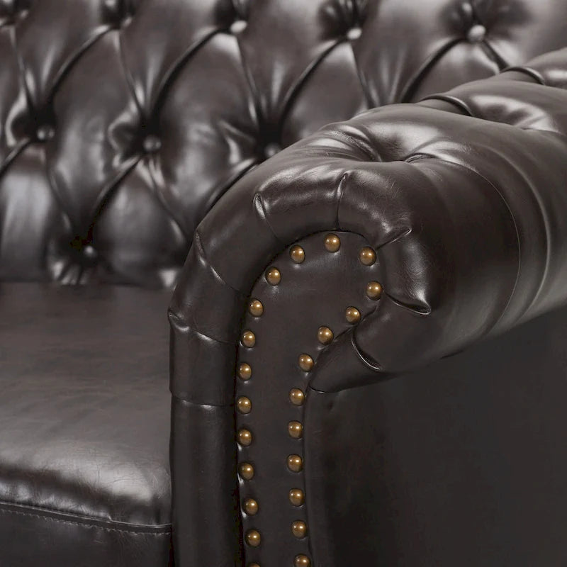 Canapé Chesterfield capitonné en similicuir
