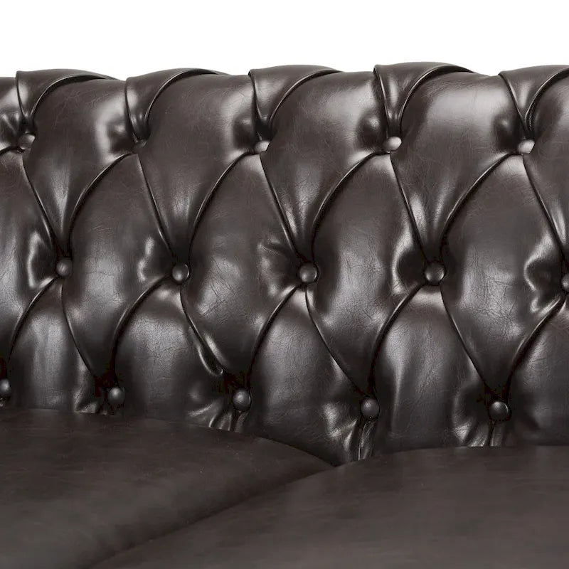 Canapé Chesterfield capitonné en similicuir